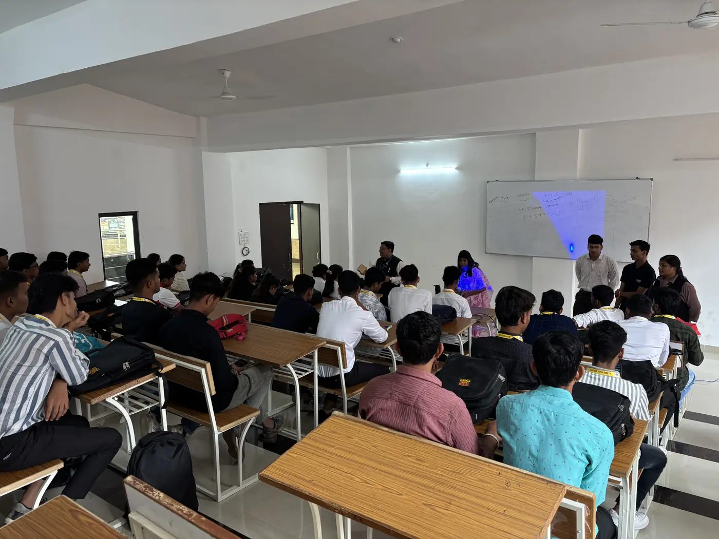 Students attending a hands-on demonstration in a lecture hall