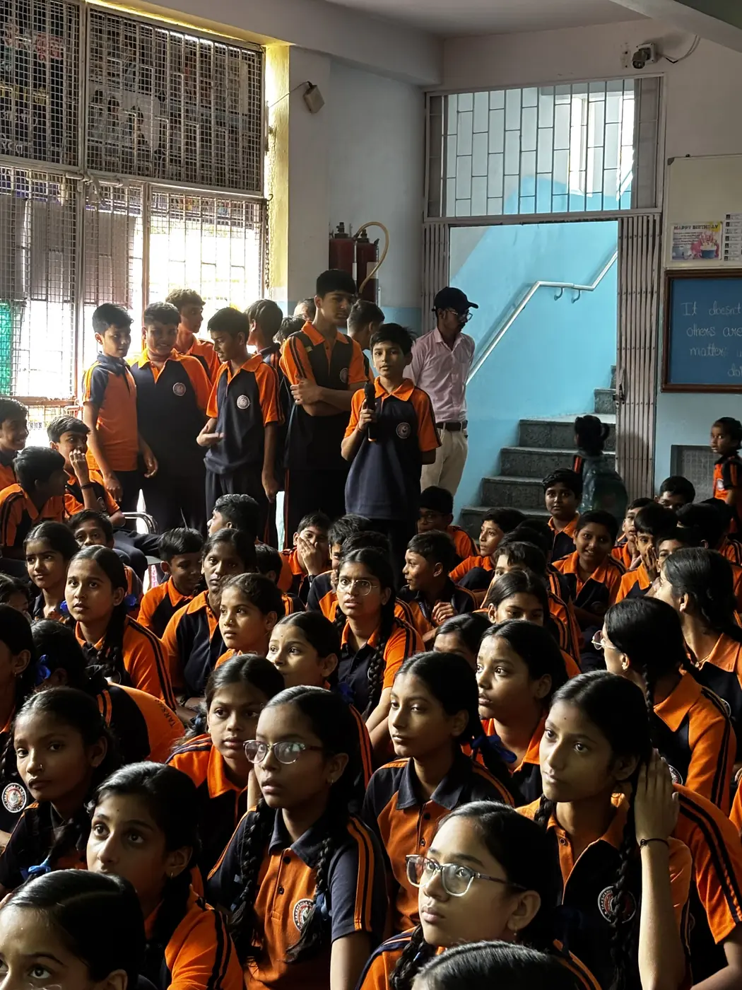 School students listening attentively during a STEM session